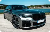 BMW car on carrier truck